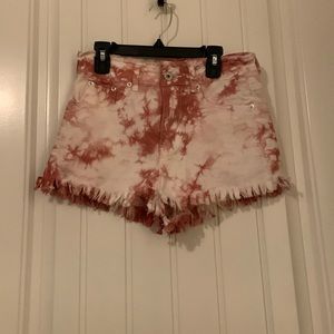Mauve tie dyed cutoff shorts. Size Small